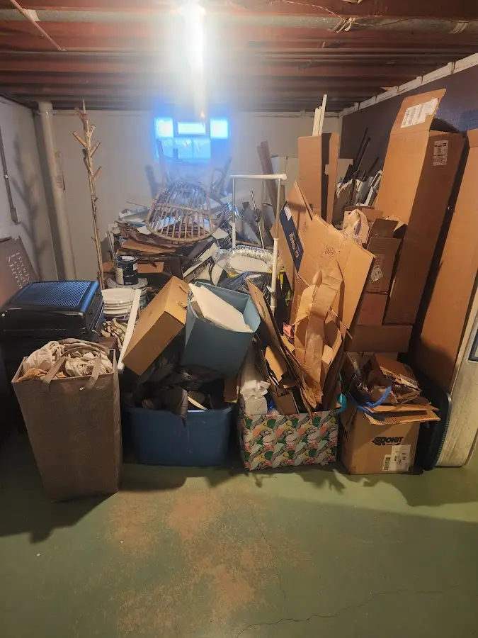 Roll-off dumpster container at job site for Roll Off Dumpster Rental in Butner